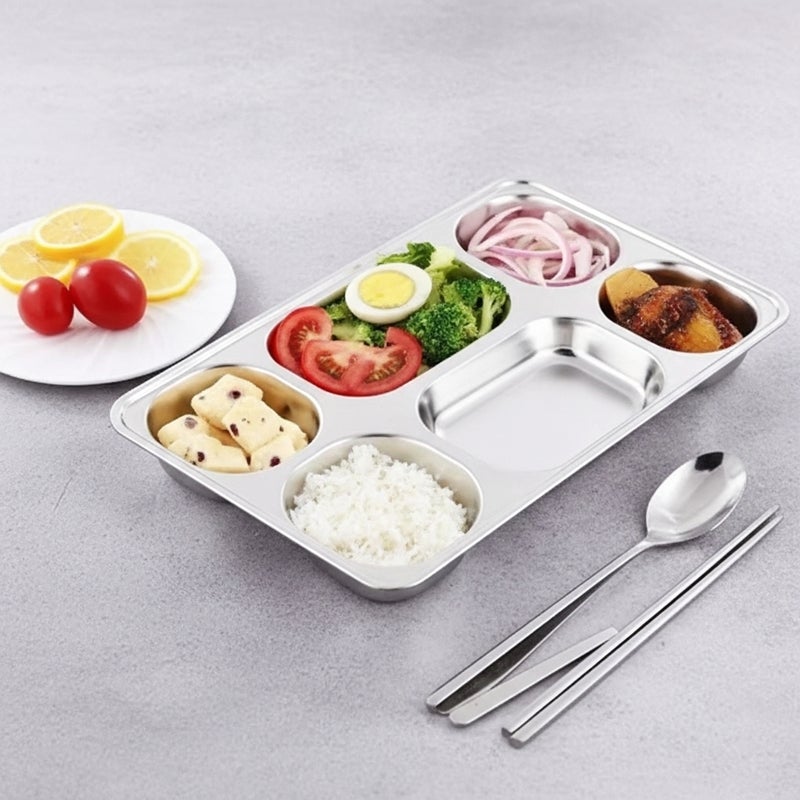 general This stainless steel serving tray, divided into six sections, is specially designed for serving complete meals in an organized and healthy way. It allows you to separate rice, protein, vegetables, sauces, and side dishes within the same dish without them mixing, making it ideal for everyday meals, children's meals, and healthy diets.



Made of high-quality, rust-resistant stainless steel, this tray is durable and sturdy enough to withstand daily use in homes and restaurants. It also features a designated slot for a spoon and fork for added convenience while serving.



Its smooth surface makes it easy to clean and it doesn't absorb odors or flavors, making it a practical and safer alternative to plastic dishes. It's an ideal choice for Egyptian kitchens, schools, hospitals, and lunchboxes. - Image 3